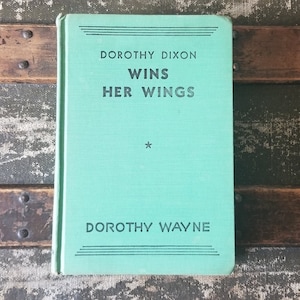 Dorothy Dixon Wins her Wings, vintage Dorothy Dixon, Dorothy Wayne, old book decor, vintage green book
