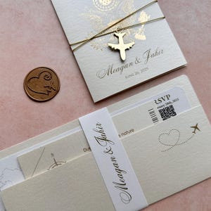gold passport wedding invitation, gold passport and boarding pass invitation, acrylic plane passport invitation and gold foil, foil passport