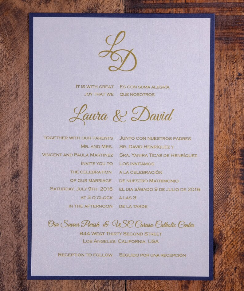 May include: A wedding invitation with a gold and white design. The invitation features the names Laura and David, the date of the wedding, and the location of the ceremony. The invitation also includes the text "It is with great joy that we..." and "Es con suma alegr&iacute;a que nosotros..."