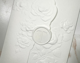 Letterpress wedding invitation in a sculpted embossed folder, embossed flower folder & letterpress invitation, letterpress pocketfold suite