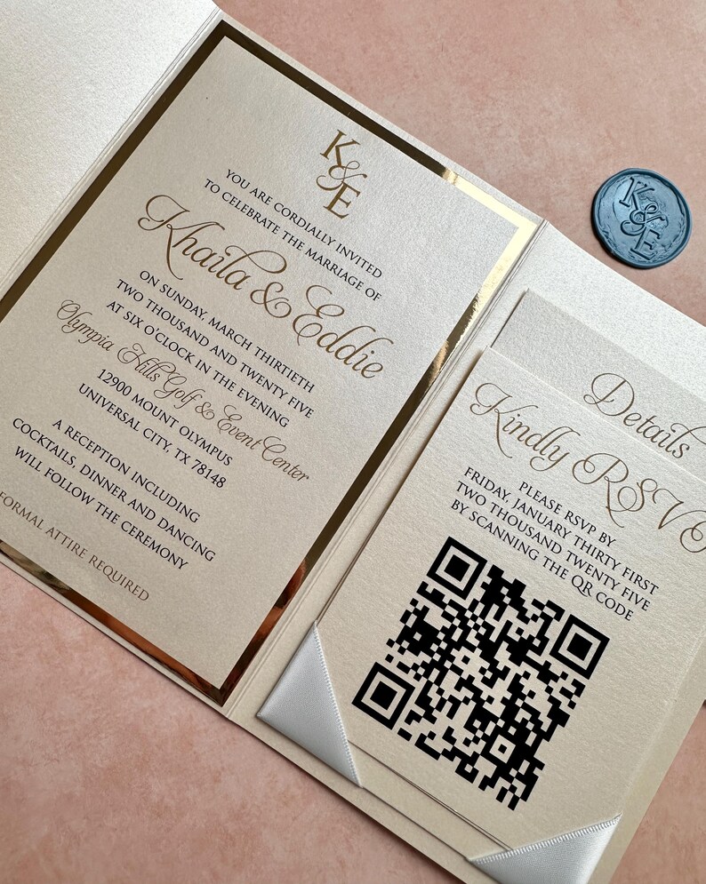 May include: Gold and white wedding invitation with a gold border and a white ribbon. The invitation includes the names Khaila & Eddie, the date and time of the wedding, and the location. The invitation also includes a QR code for RSVP.