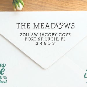 May include: White envelope with the address "THE MEADOWS" and address details in black. The text "Stamp Love 100% Guaranteed" and "USA maker Stamp Customs .etsy.com" are also visible. The address includes the city of Port St. Lucie, FL.