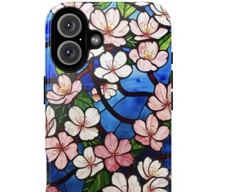 May include: A phone case featuring a stained-glass design with pink and white cherry blossoms on a blue background. The case has a glossy finish and a camera cutout.