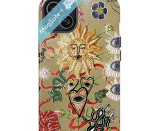 May include: A phone case with a beige background and a colourful design featuring a sun, eyes, hearts, a snake, and a tiger. The text "MagSafe+" is visible on the case.