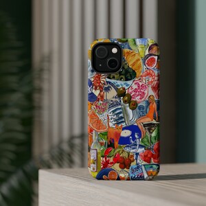 May include: A colorful phone case with a collage of images, including a cat, fish, fruit, and a woman in a swimsuit. The case has a blue and white background with a red and yellow accent. The text "ORIGINA" is visible on the bottom of the case.