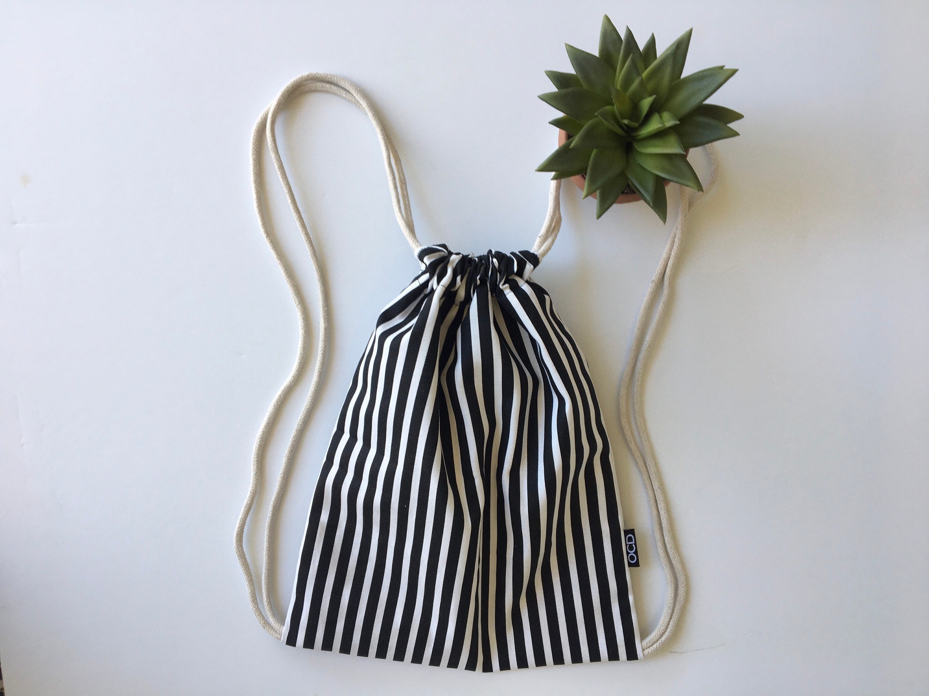 striped backpack purse