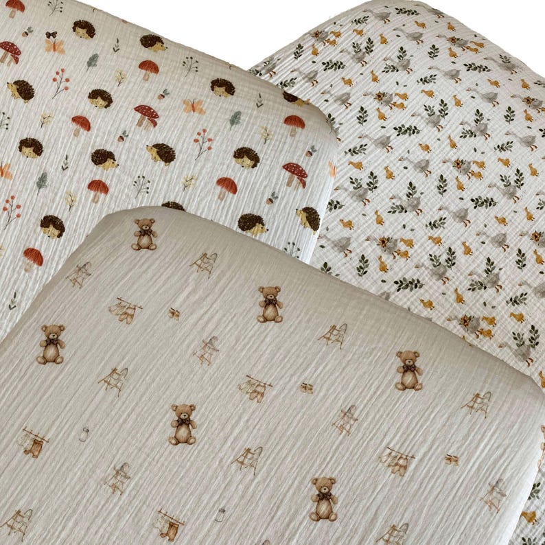 Organic muslin cotton fitted sheets for Nestig Wave, Cloud, Snow, Palm, and Full Cribs.
