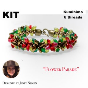 May include: A kit for making a Kumihimo bracelet using 6 threads. The bracelet features green, red and gold beads and has a clasp. The kit is called "Flower Parade".