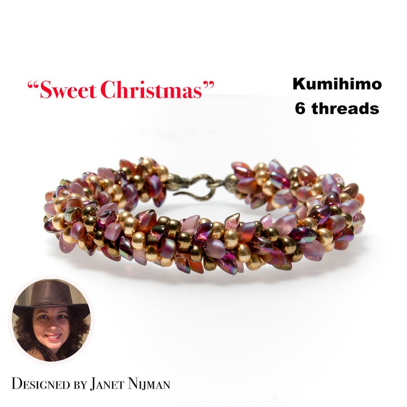 May include: A close-up of a beaded bracelet with a gold and purple color scheme. The bracelet is made with small beads and has a clasp closure. The bracelet is labeled "Sweet Christmas" and "Kumihimo 6 threads".