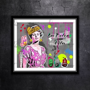 May include: A colorful illustration of a woman wearing a crown and a pink dress, with the text "La Dolce Vita" in a graffiti style. The background is a gray wall with splashes of color. There are three scooters in the bottom right corner.