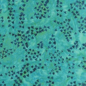 May include: Teal blue fabric with a repeating pattern of dark blue teardrop shapes.