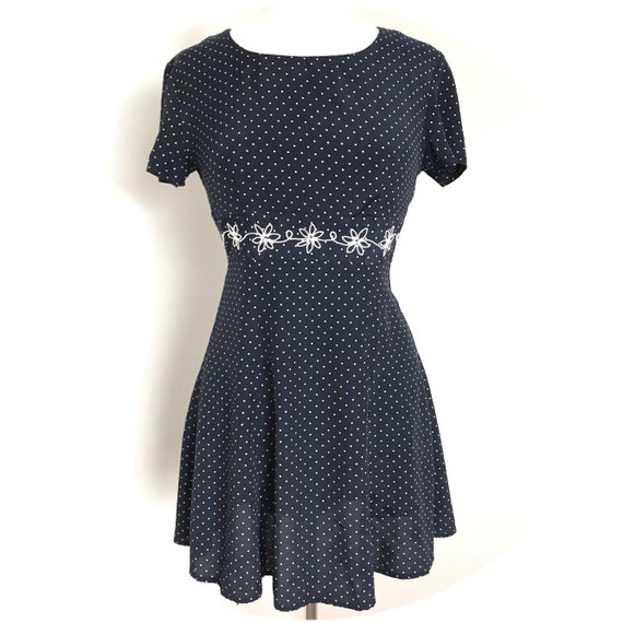 Navy blue retro sundress with white polk dots & fl