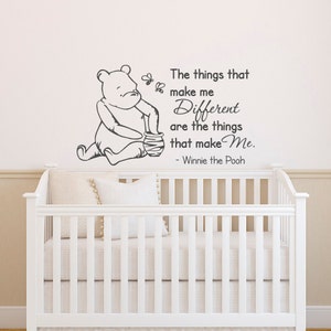 May include: Winnie the Pooh wall decal with a quote that reads "The things that make me Different are the things that make Me. - Winnie the Pooh". The decal features a cartoon image of Winnie the Pooh holding a honey pot.
