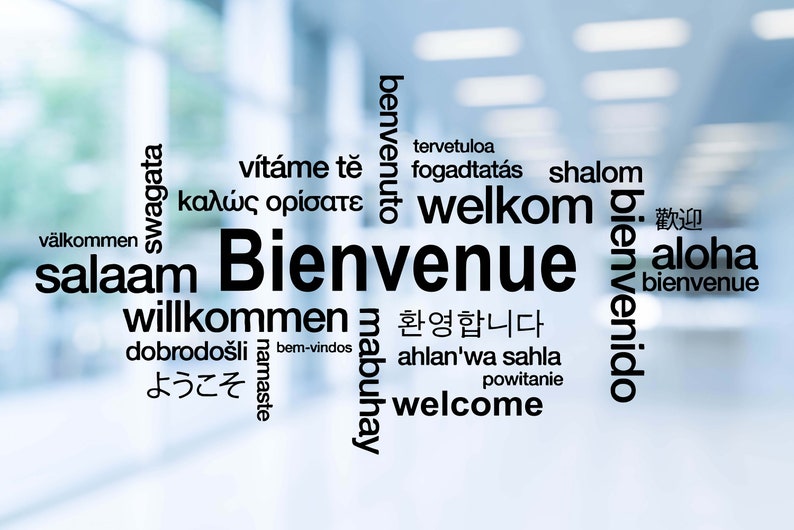 May include: A word cloud with the word "Bienvenue" in the center, surrounded by words for "welcome" in different languages, including English, French, Spanish, German, Italian, Japanese, and more.