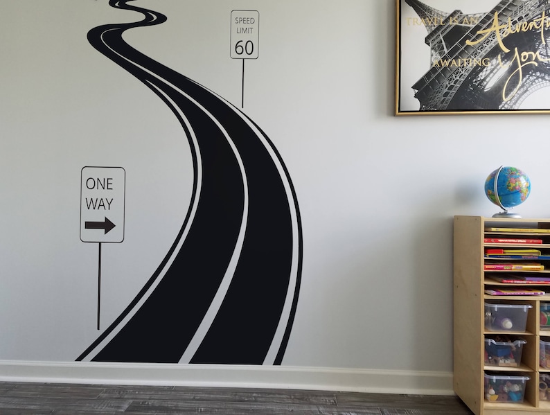 May include: A black and white road sticker with a one-way sign and a speed limit sign that says "Speed Limit 60".