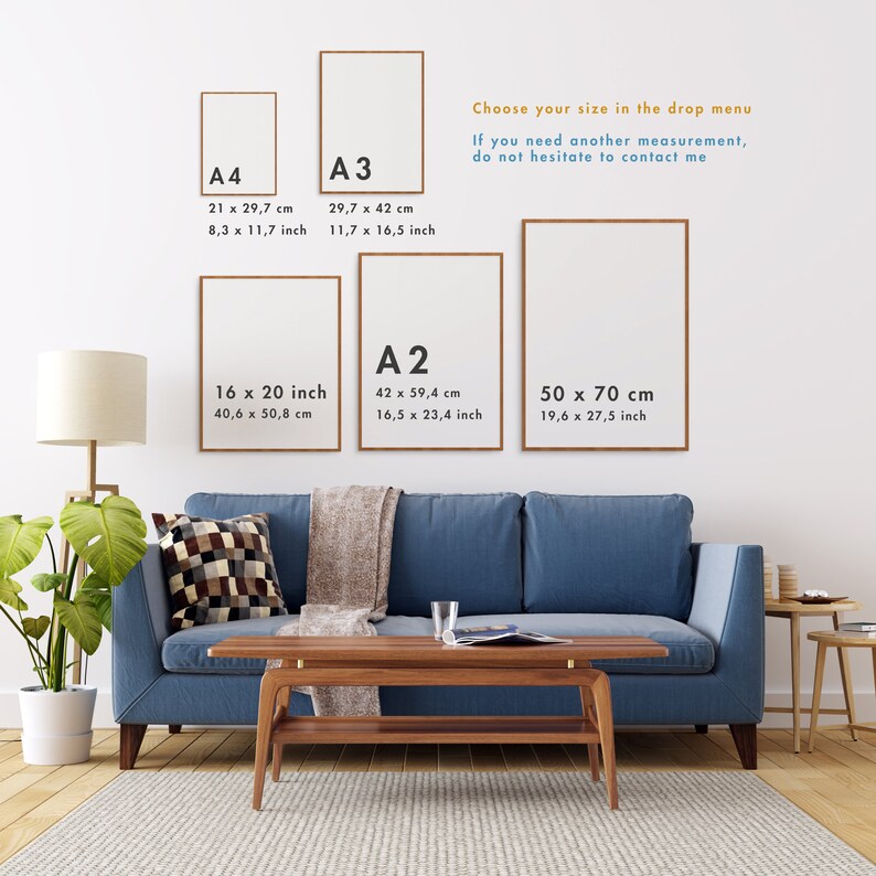 May include: A living room interior with a blue sofa and a coffee table. There are three framed prints on the wall behind the sofa. The prints are labelled with different sizes in centimetres and inches: A4, A3, A2, 16 x 20 inches, 50 x 70 cm. The text "Choose your size in the drop menu. If you need another measurement, do not hesitate to contact me." is printed on the wall.