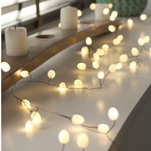 White or green or peach opaque teardrop fairy lights