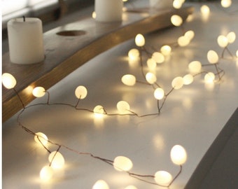 White or green or peach opaque teardrop fairy lights