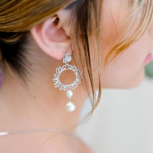 White pearl wedding earrings. Cali, dangling earlobe earrings. Ivory pearl bridal jewelry.