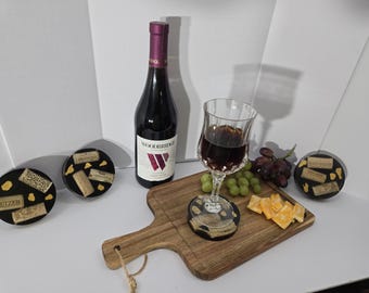 Wine cork and epozy coasters with goldlike deposits