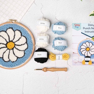 Puede incluir: Kit de aguja de punz&oacute;n de margarita con hilo blanco, azul, negro y amarillo, una herramienta de aguja de madera e instrucciones.