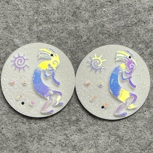 White Kokopelli Pair, 25mm Round Cabochons with AB Finish, F10