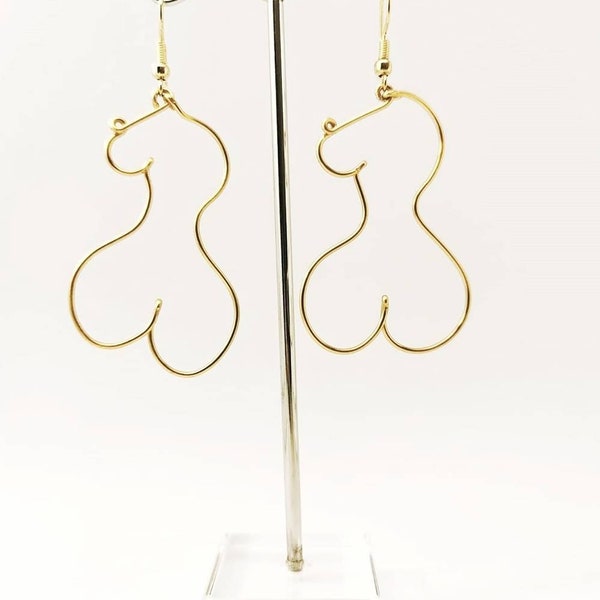 Boucles d'oreilles abstraites rétro représentant des silhouettes de corps de femme dénudés, avec des formes de fesses et de seins.