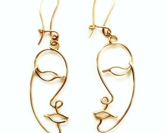 Boucles d&#39;oreilles fines demi-visage en fil d&#39;or, style street art