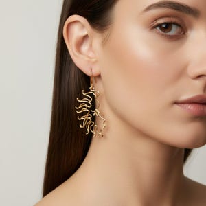 Boucles d'oreilles soleil et lune immagine 1