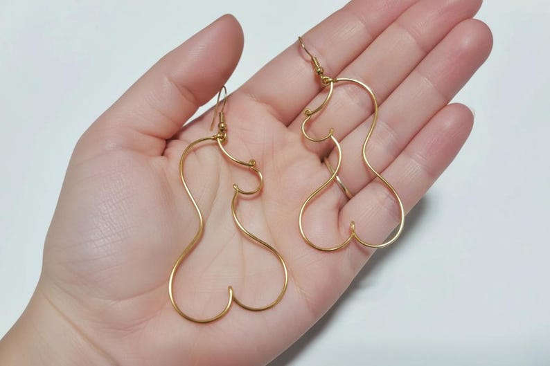 Boucles d’oreilles silhouette visage féminin en fil image 3
