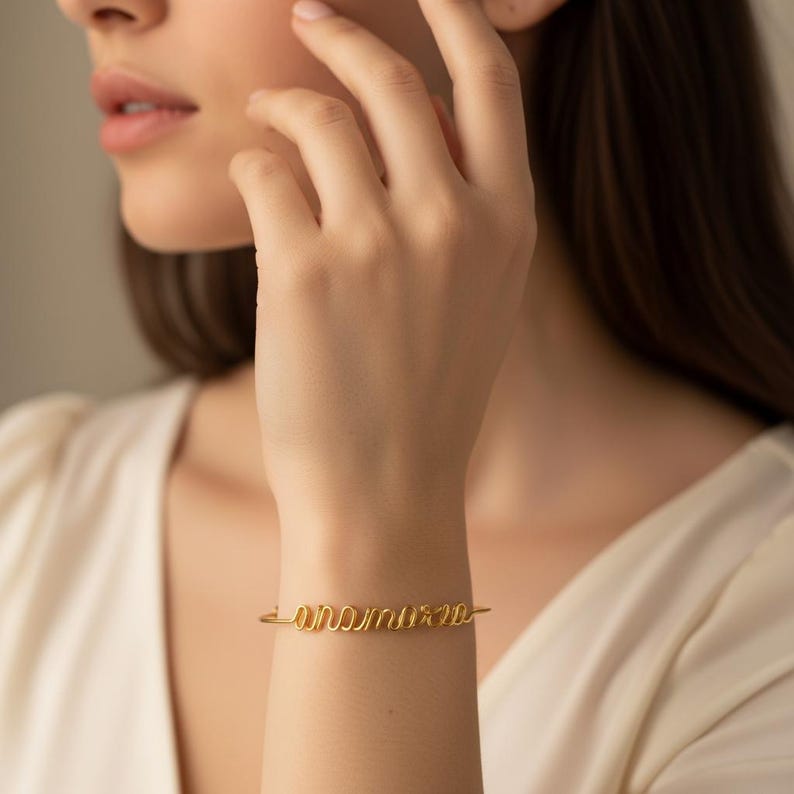 gold personalized name bracelet on wrist elegant minimalist jewelry gift for her