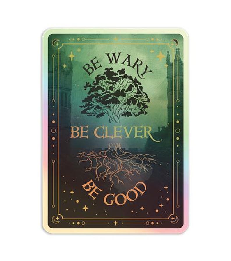 May include: A rectangular sticker with a holographic border. The sticker features a green and black background with the words "BE WARY, BE CLEVER, BE GOOD" in a stylized font. A tree and its roots are also depicted.