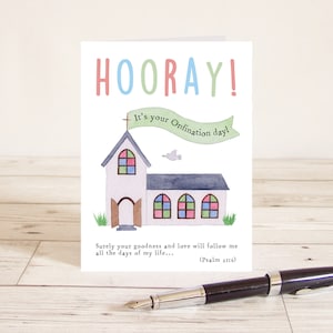 May include: A card featuring a watercolour illustration of a church with a banner that reads "It's your Ordination day!" The card has the text "HOORAY!" in colourful letters and a quote from Psalm 23:6.