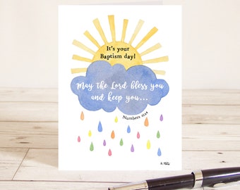 Baptism card "May the Lord bless you and keep you" (Numbers 6:24) Bible verse with sun, cloud and rainbow raindrops