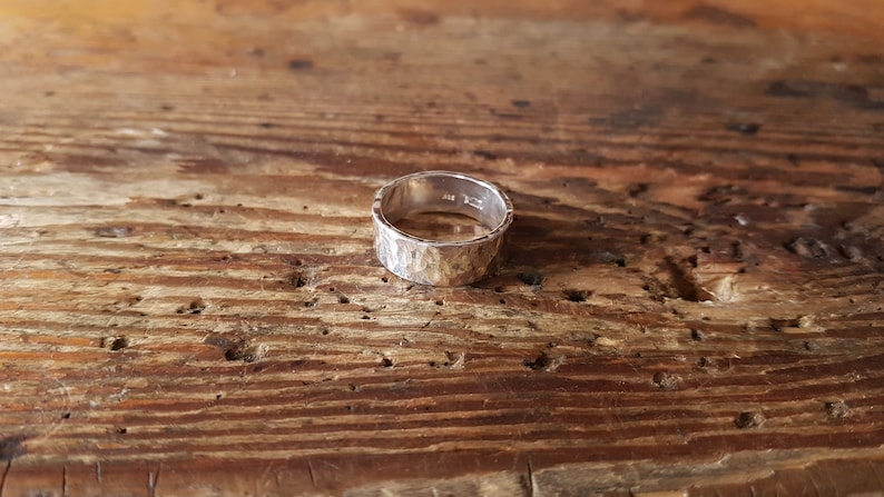Heavy silver ring hammered surface