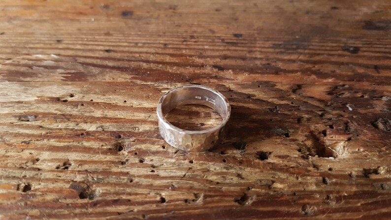 Heavy silver ring hammered surface