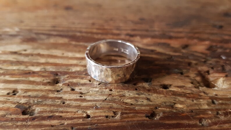 Heavy silver ring hammered surface