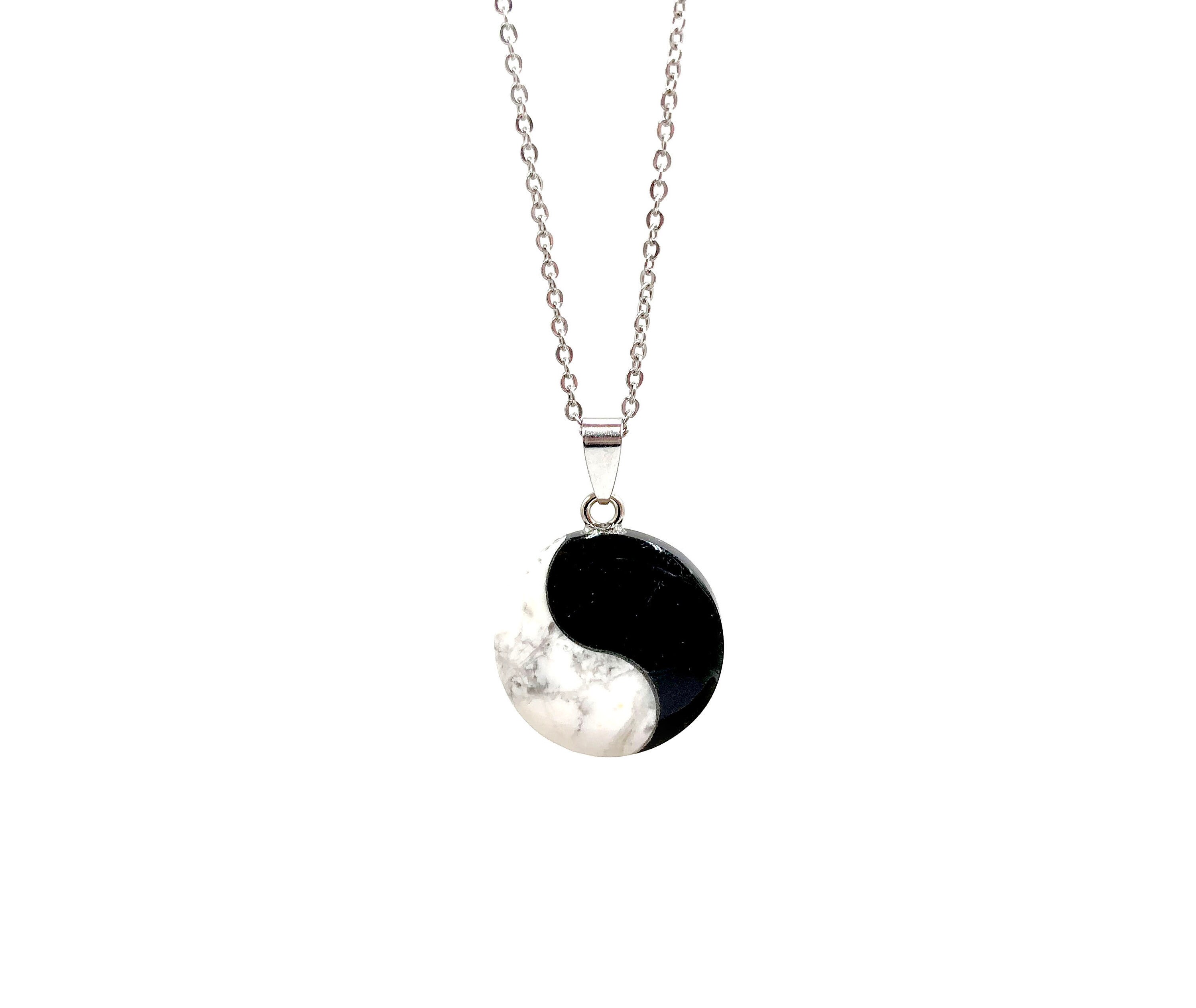 clear quartzcrystal necklace half of yin yang symbol clear quartzcrystal necklace half of yin yang symbol