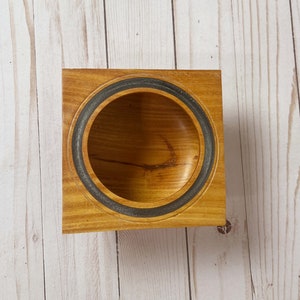 Osage Orange wooden bowl with square top and round opening and bowl - top view looking into the bowl