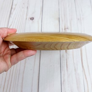 Cypress wooden potpourri bowl - being held - side view