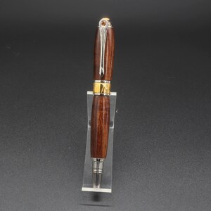 Front view of fountain pen made of ringed gidgee wood.