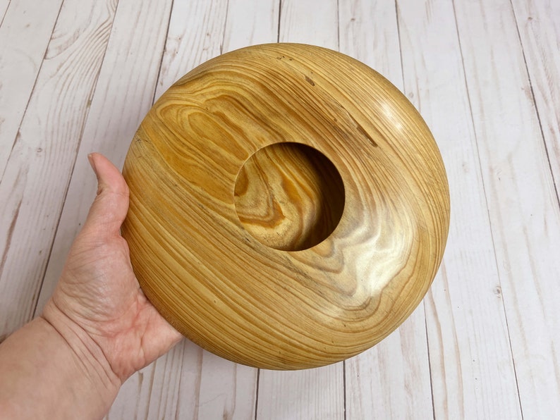 Cypress wooden potpourri bowl - being held - top view