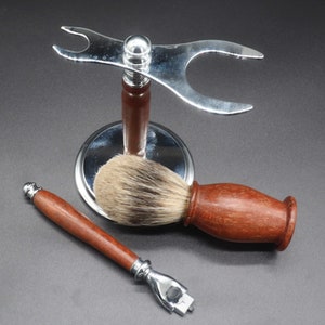 Eucalyptus shaving set with brush, stand, and razor handle over a dark background