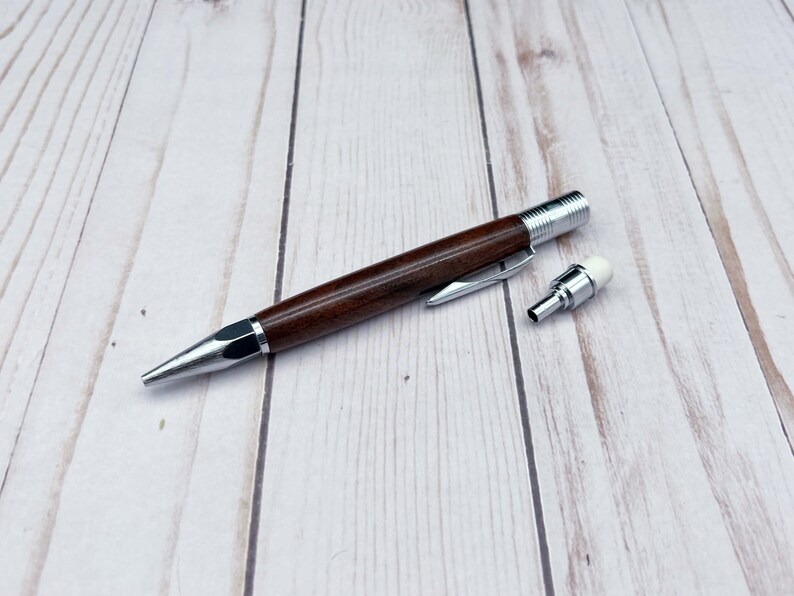Side view of 2mm mechanical pencil made in black walnut wood - with the eraser/sharpener removed