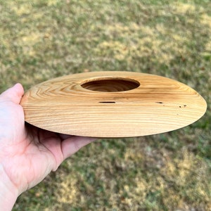 Cypress wooden potpourri bowl - being held in natural light - side view