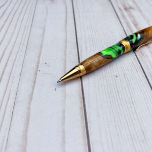 Olive wood and resin twist pen with satin gold hardware