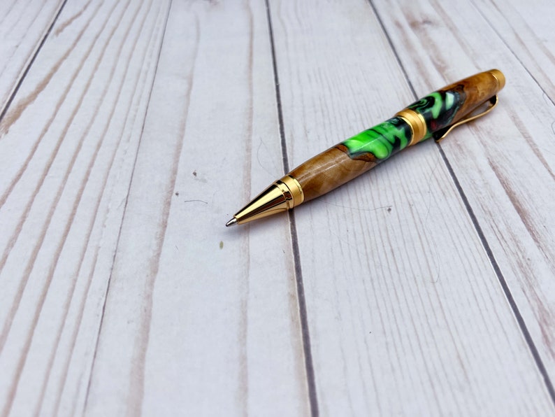 Olive wood and resin twist pen with satin gold hardware