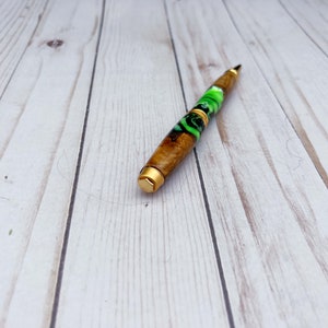 Olive wood and resin twist pen with satin gold hardware