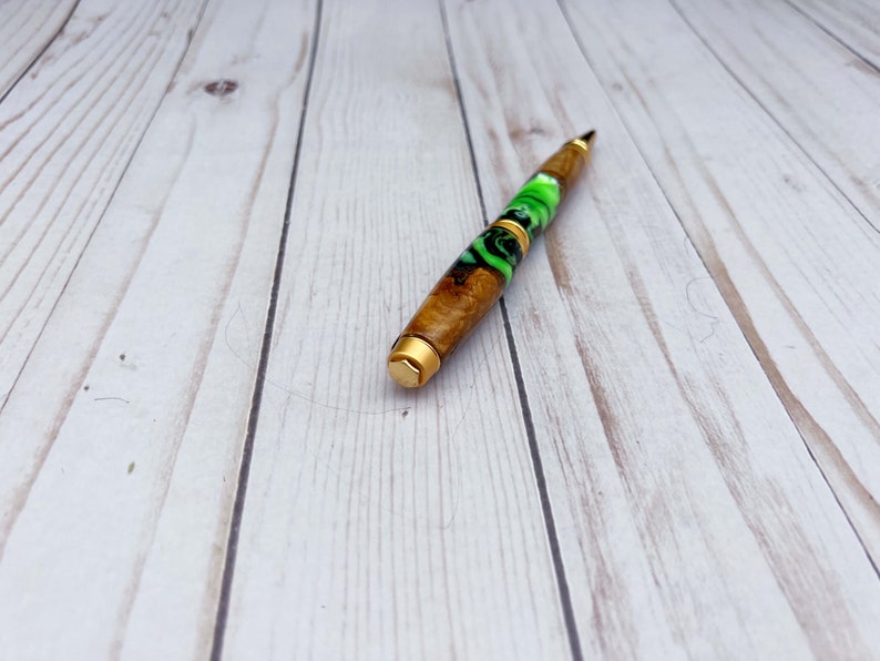 Olive wood and resin twist pen with satin gold hardware