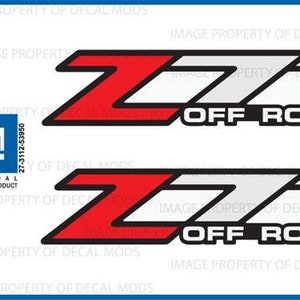 May include: Two black and white decals with red accents. The decals feature the text "Z71 OFF ROAD".